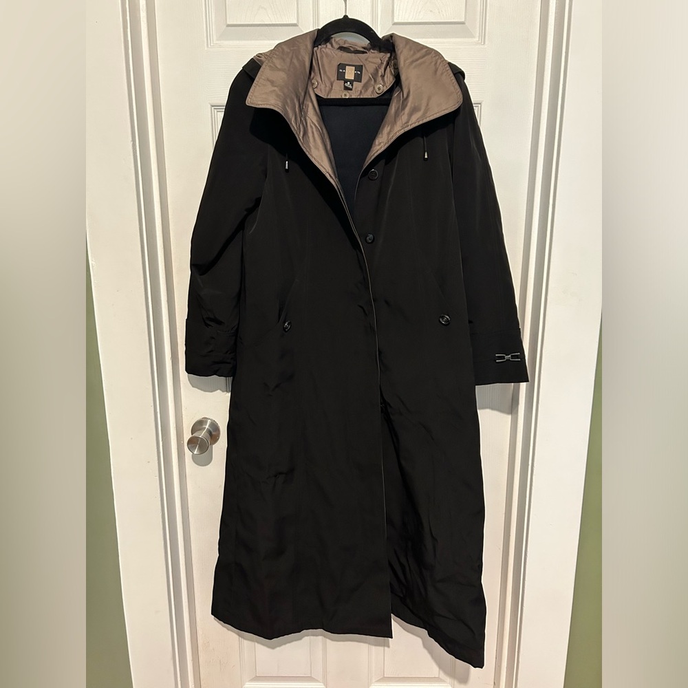 Rain coat with removable wool lining and hood. Size small but fits like a M/L